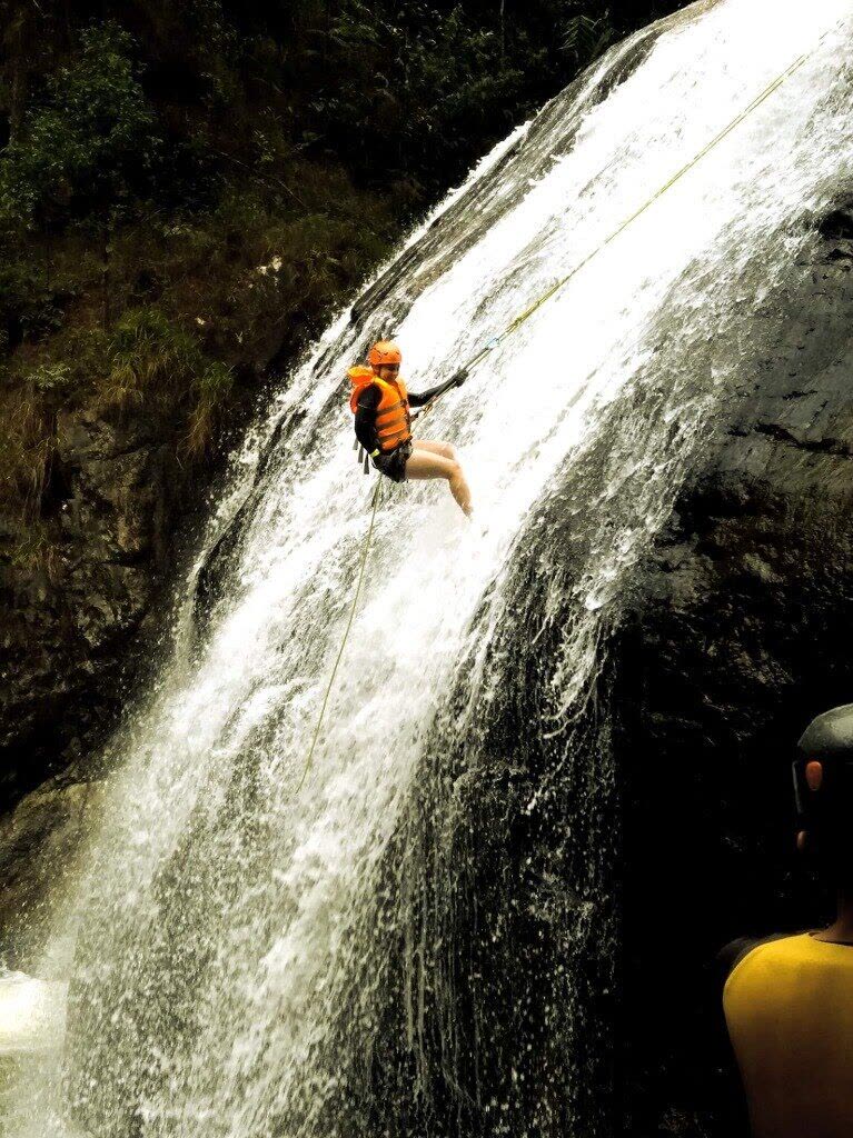 Action Abseiling Down Gushing Cascades